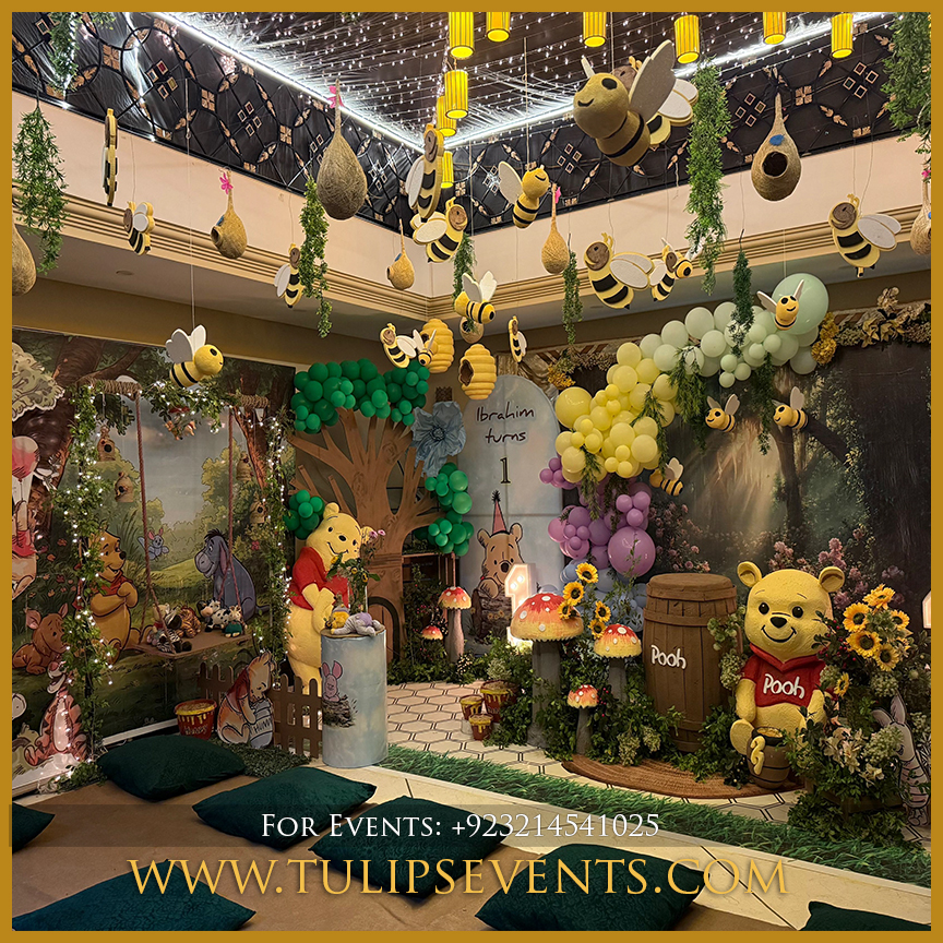 Winnie the Pooh birthday decoration setup in Lahore Pakistan