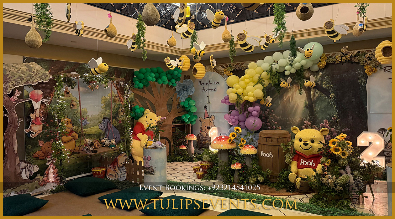 Winnie the Pooh birthday decoration setup in Lahore Pakistan