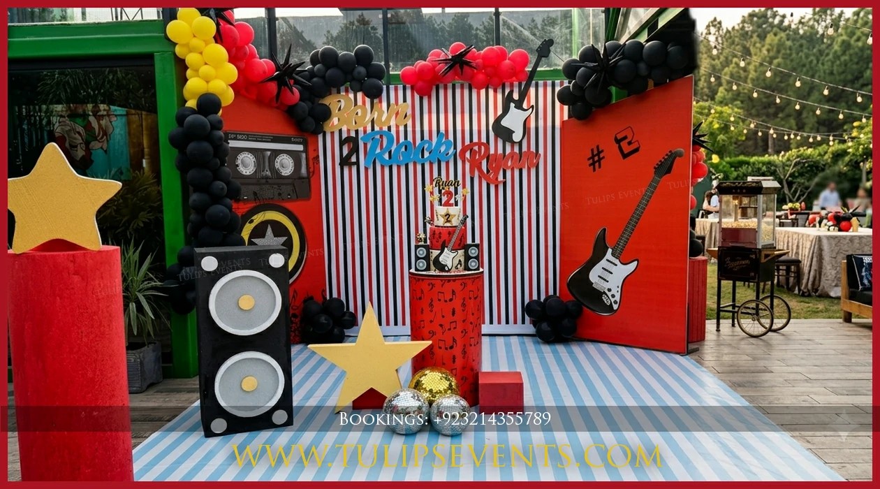Black and gold Rock Star balloon decoration in Jhelum